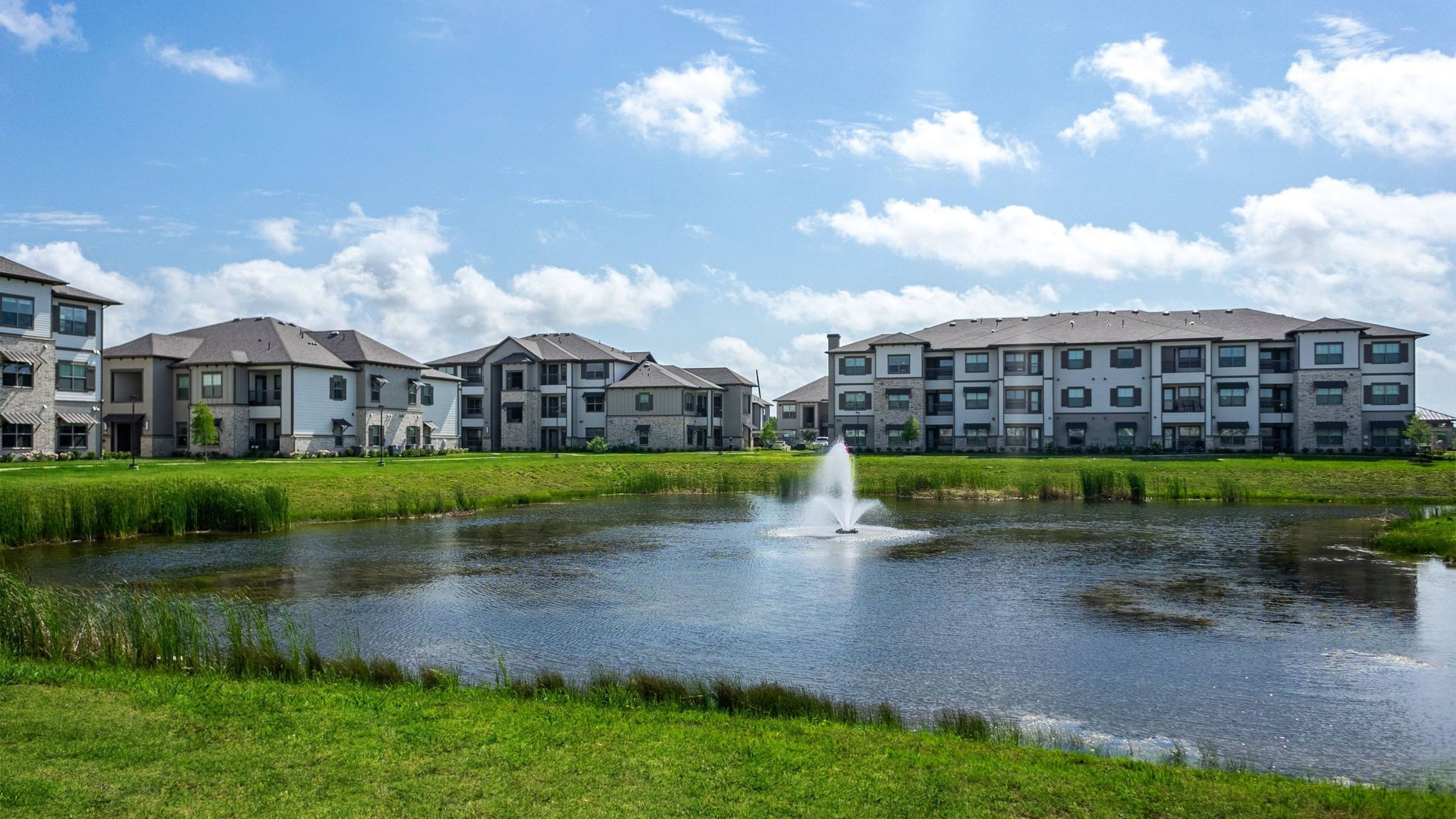 Hawthorne at Bay Forest apartment community exterior and surrounding landscaping