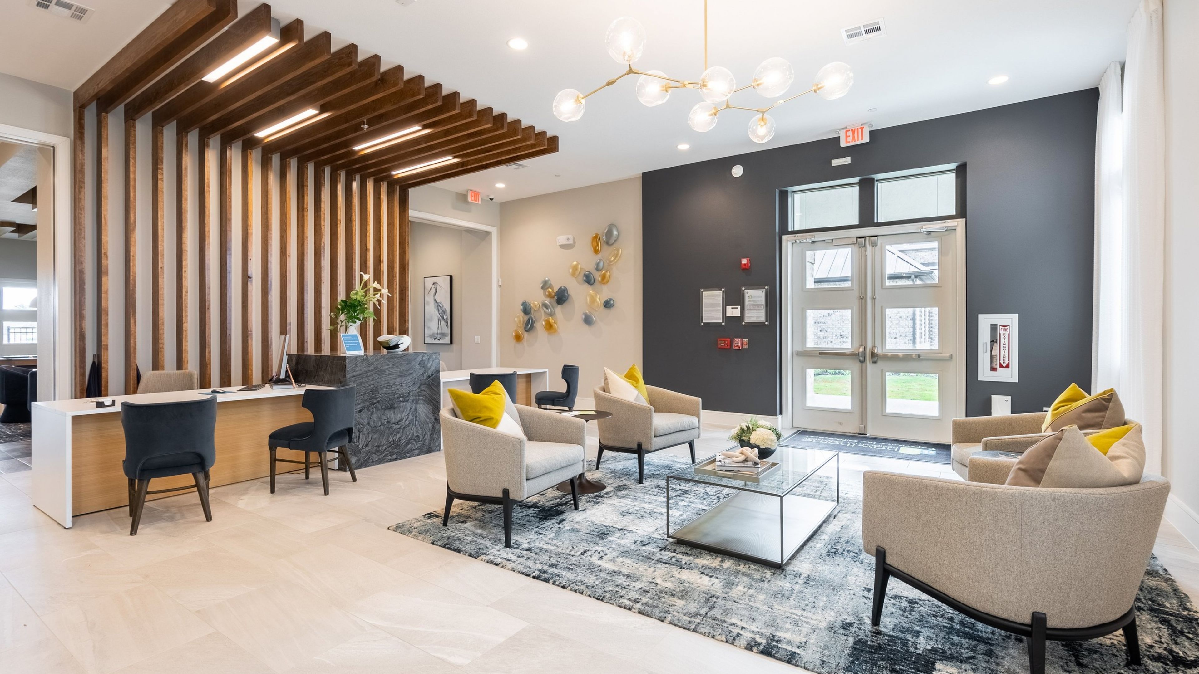 Hawthorne at Bay Forest resident leasing office with seating area and beautiful finishes