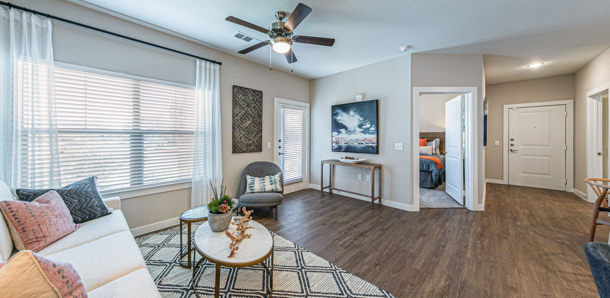 Hawthorne at Bay Forest apartment living space with wood floors and large open plan living area